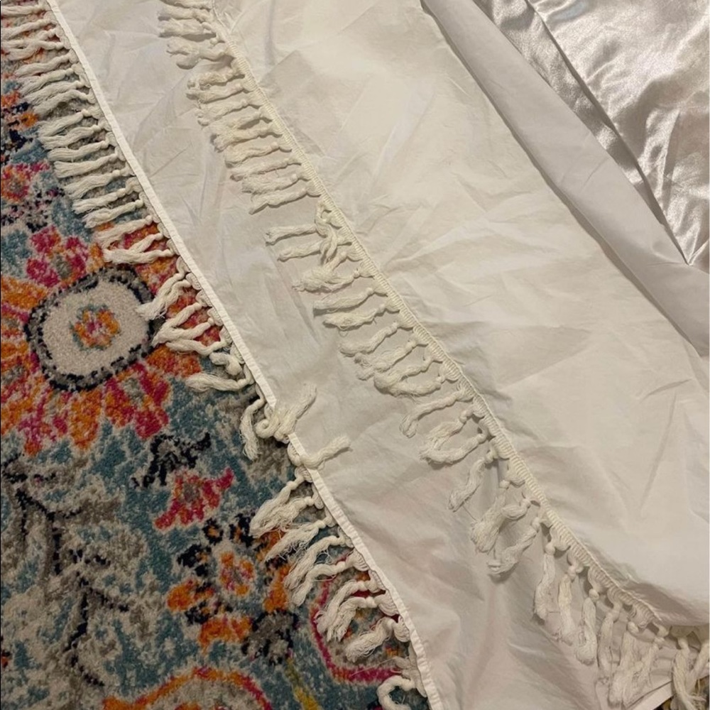 Fringe crib skirt